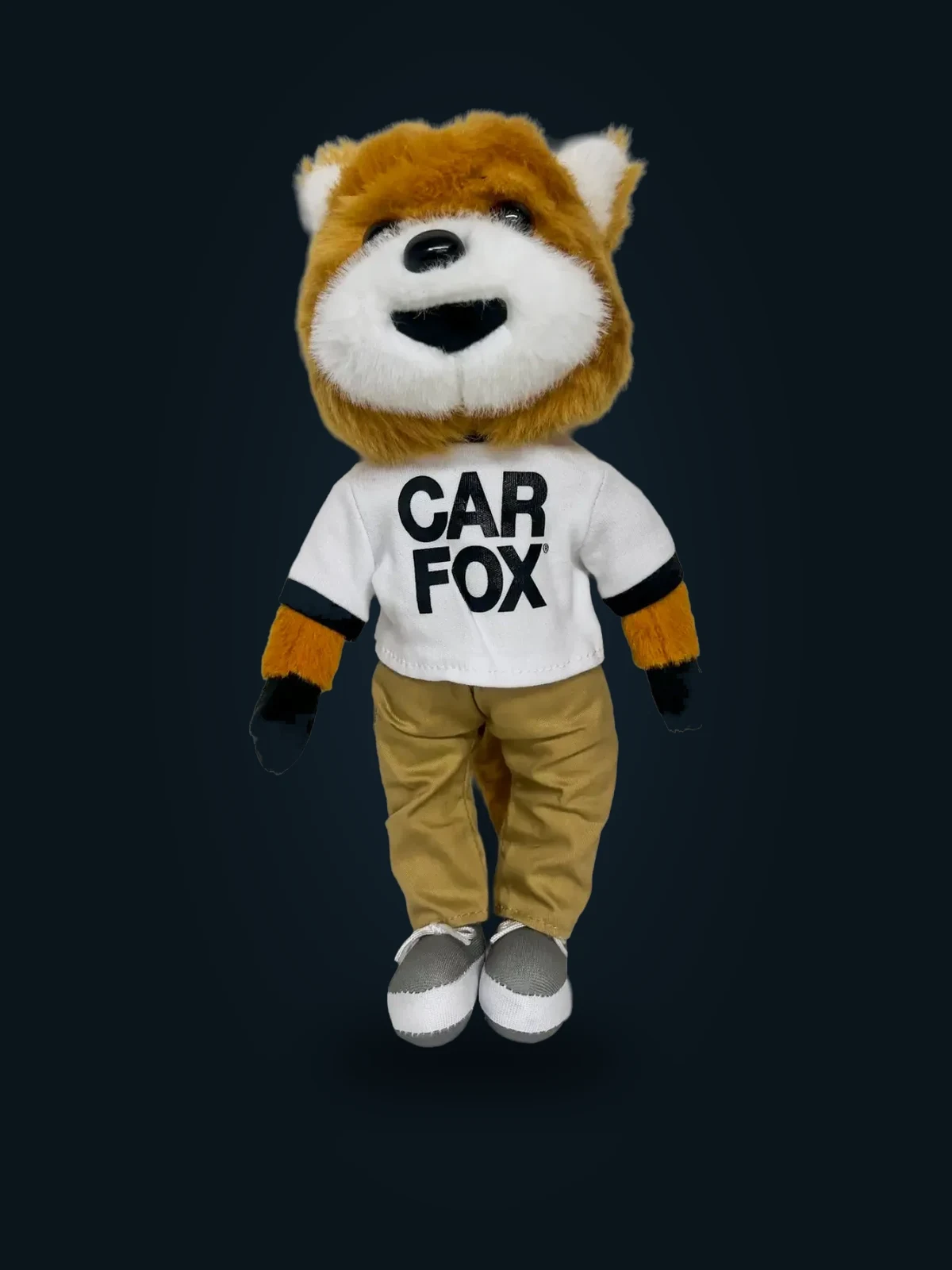 CARFAX Car Fox mascot plush in a branded white shirt